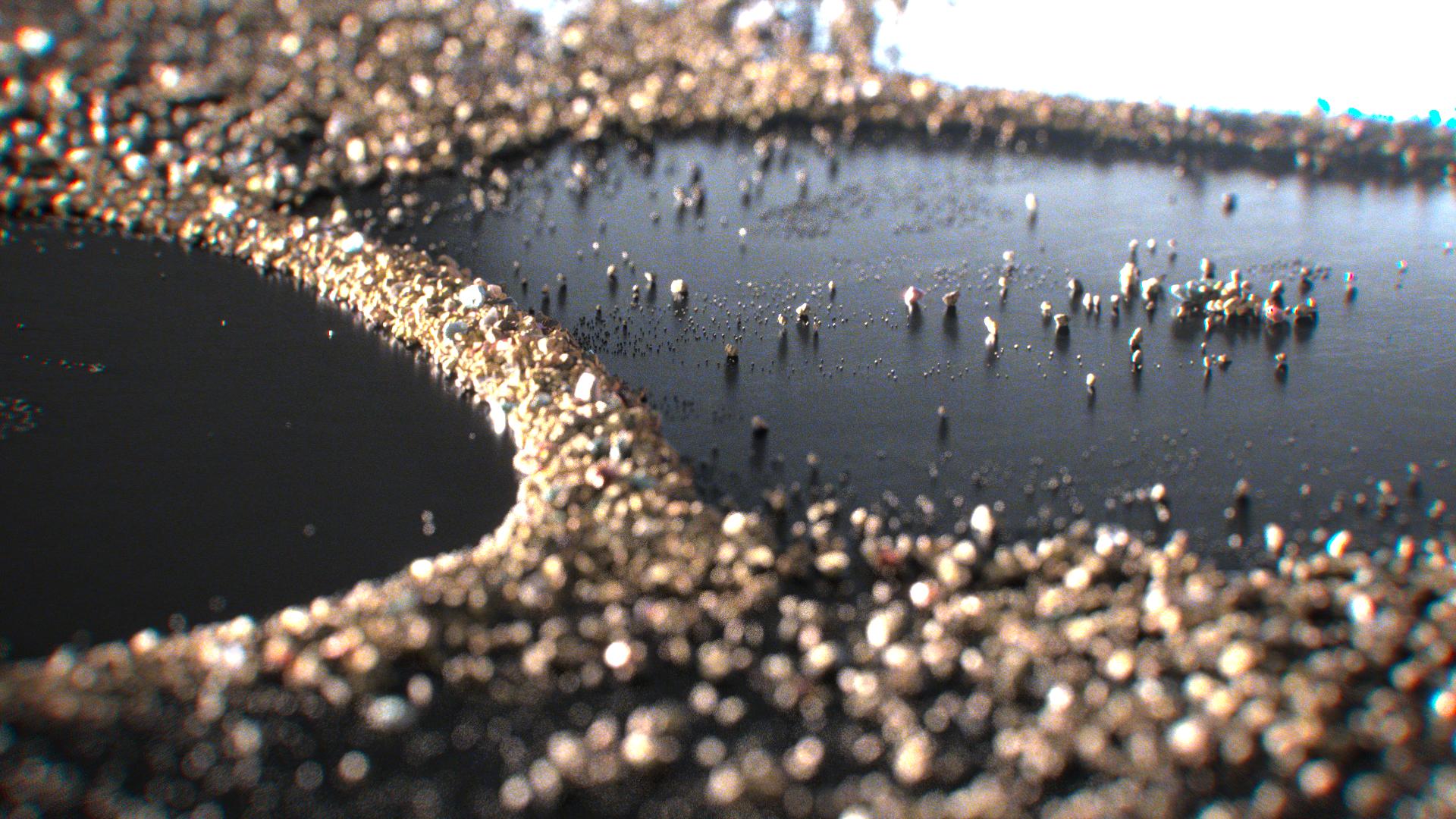 Grazing macro view across grains forming raised ridges and isolated clusters on a Chladni surface